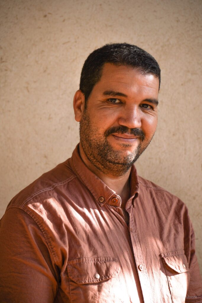 man smiling in a sunny day