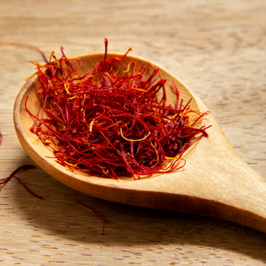 saffron spice in a wooden spoon